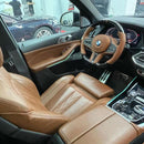 Customized Orange Leather Carbon Fiber Steering Wheel For BMW G Series and M5 in car view
